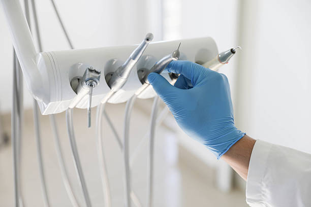 Professional Dental Implants technician working in Central, LA